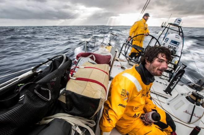 Onboard Abu Dhabi Ocean Racing - Louis Sinclair and skipper Ian Walker guide Azzam through the light breeze as the sun sets behind in the Southern Ocean - Leg five to Itajai -  Volvo Ocean Race 2015 © Matt Knighton/Abu Dhabi Ocean Racing